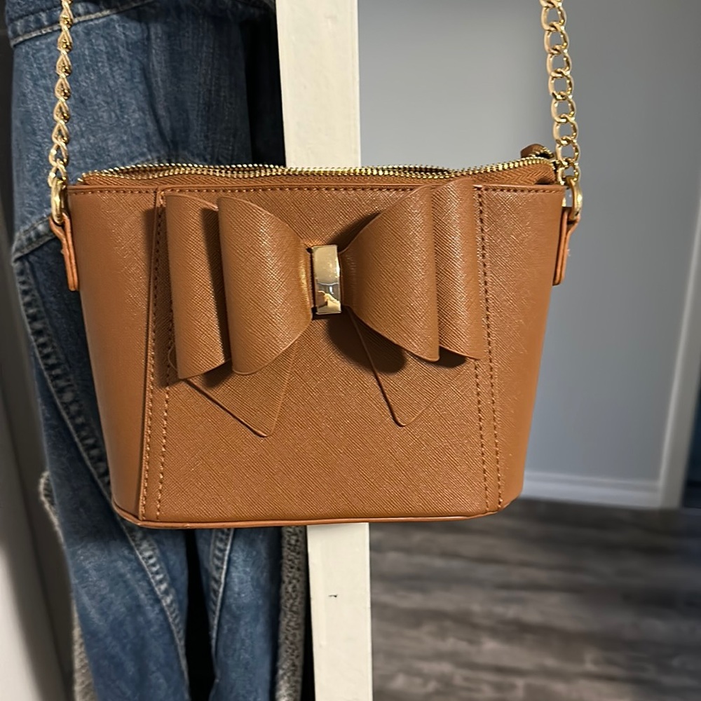 Brown bow purse
